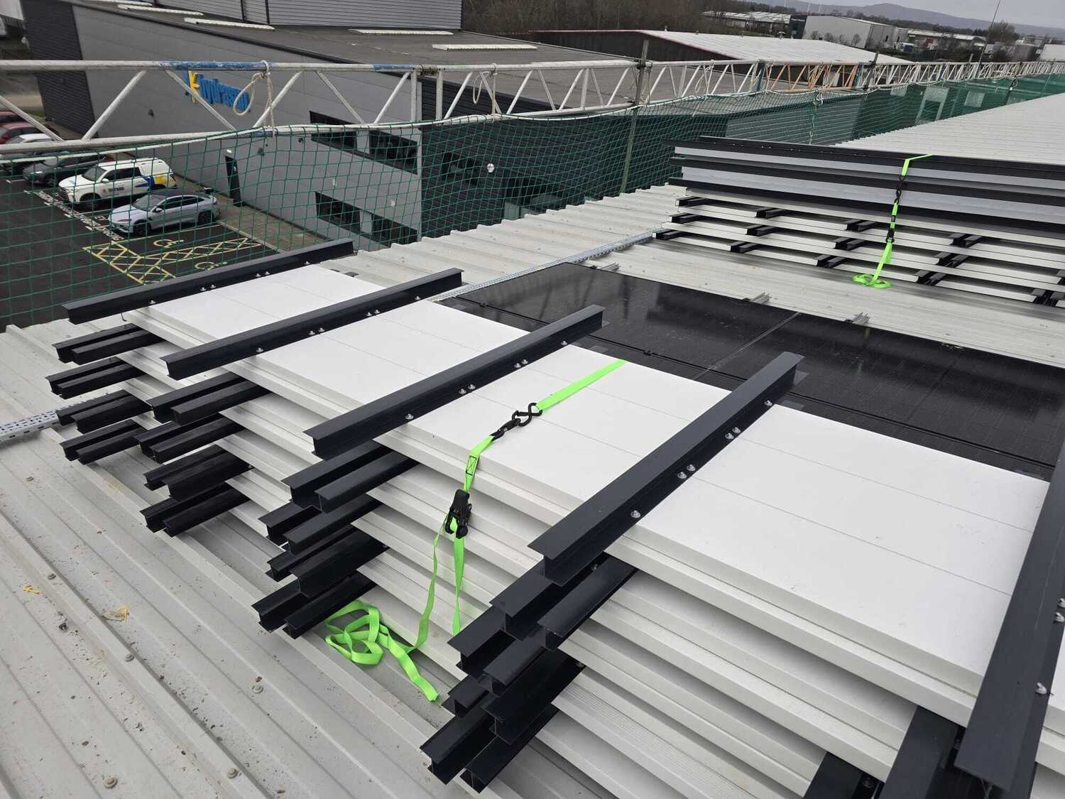 Loading of roof walkway system to roof